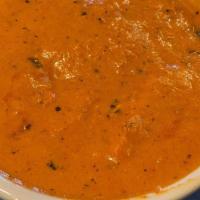 Butter Chicken
 · Chicken roasted in clay oven and cooked with our special selection of mild spices, butter an...