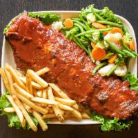 Bbq Baby Back Ribs · Our award winning ribs are smoked and slow-roasted for tenderness guaranteed to fall off the...