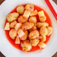 Hawaiian Chicken · Tender chicken breast battered and deep fried. Layered in sweet and sour sauce, topped with ...