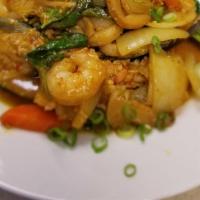 Seafood Curry · Stir fried seafood sautéed with garlic, eggs, mushrooms, celery, bell peppers and curry powd...
