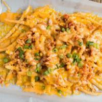 Kimchi Fries · Crispy natural fries topped with melted cheddar bacon kimchi red and green onions and spicy ...