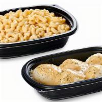 Dinner Side, Family Size · Choose between mashed potatoes and gravy or macaroni and cheese