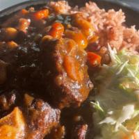 Oxtail Bowl · Oxtail and beans seasoned with blended herbs and spices. Served with coconut rice and beans ...