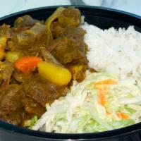 Curry Goat Bowl · Curry goat cooked in an authentic Jamaican curry sauce. Seasoned with blended herbs and spic...