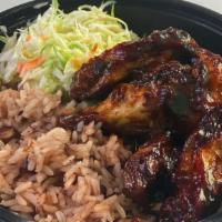 Wings Bowl · BBQ or jerk wings, served with coconut rice and beans or vegetable white rice, and fresh ste...
