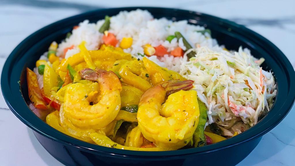 Curry Shrimp Bowl · Jumbo gulf shrimp: saute and reduce in fresh squeeze coconut cream/juice. With bell peppers: red, green and yellow. Season with island spices and herbs. Serve with side of vegetable white rice or rice and beans and coleslaw.