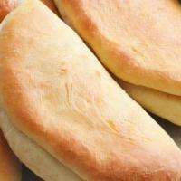 Coco Bread · Buttery, Subtly Sweet Bread made w/ Coconut Milk