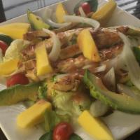Chicken Raspberry Salad · Grilled chicken on a bed of shredded lettuce, mango wedges, grape tomatoes, spinach, avocado...