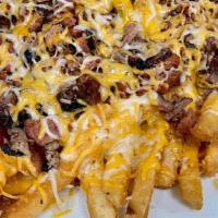 Holy Smokes · Loaded fries plus 2 meats, shredded cheese and BBQ sauce, with available toppings