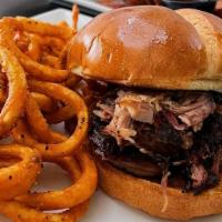 Pulled Pork Sandwich · Pork pulled right off the bone.