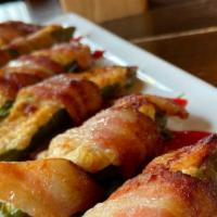 Jalapeno Poppers ** · Jalapeno, Cream Cheese, Green Onion, Bacon, Raspberry Coulis