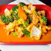 Curry Stir-Fry · Our homemade red curry stir fried with fresh peapods, white onions, broccoli and carrots wit...