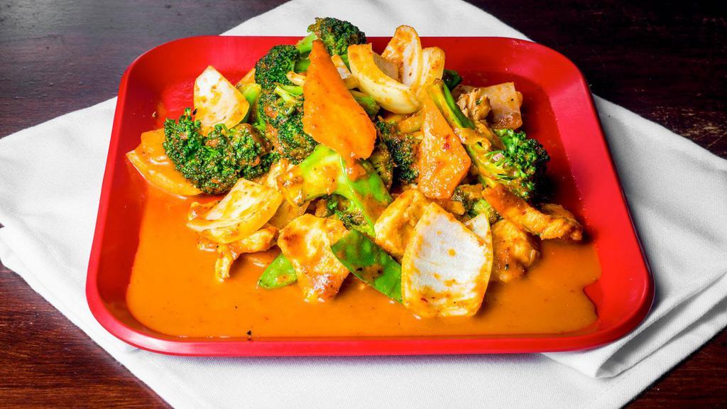 Curry Stir-Fry · Our homemade red curry stir fried with fresh peapods, white onions, broccoli and carrots with a little kick of spice.