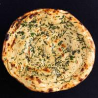 Pudina Paratha · A whole-wheat bread cooked in a clay oven, seasoned with mint.