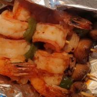Shrimp Kabob · Four sticks. Grilled onions, mushroom, and green pepper with hibachi fried rice on the side.