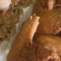 4 Whole Wings & Shrimp Fried Rice · Include can of soda.