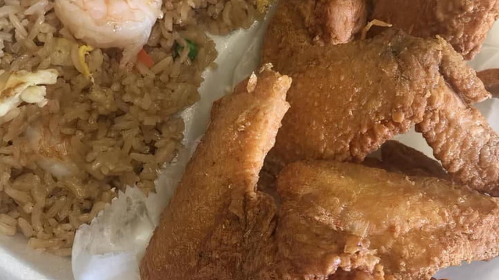 4 Whole Wings & Shrimp Fried Rice · Include can of soda.