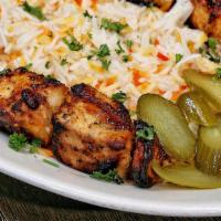 Shish Tawook · Halal. Boneless and skinless chicken breast cubes marinated in special sauce and charbroiled...