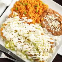 Flautas · Three deep fried tacos filled with your choice of chicken, ground beef or potato topped with...