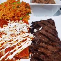 Tampiqueña · Grilled skirt steak and two cheese enchiladas, served with roasted jalapeño, salad, rice, ch...