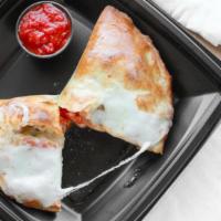 Just Meat Calzone · Pepperoni, ham, sausage, mozzarella cheese, w/ home-made sauce.