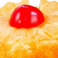 Bb'S Grandma Pineapple Upside Down Cake · BB's stars a moist cake that is topped with a layer of crushed pineapples and a cherry in a ...
