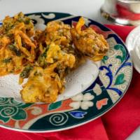 #2. Vegetable Pakora (6 Pieces) · Fritters stuffed with assorted vegetables.