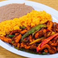 Fajitas Pollo, Res, Mixtas · Grilled chicken, steak or mix of both, bell peppers, onions served with rice and beans, tort...