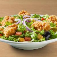 Crispy Chicken Salad · Original tossed garden salad topped with crunchy fried chicken.
Served with a garlic bread s...