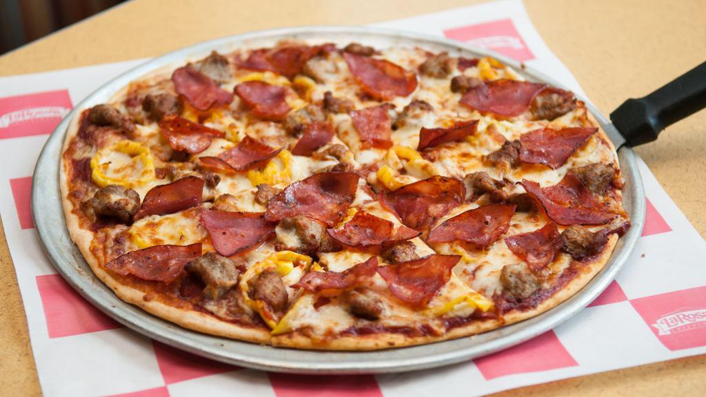 Buddy Deluxe Pizza · Family recipe pizza sauce and provolone, topped with pepperoni, sausage, spicy sausage, banana peppers and capocolla ham.