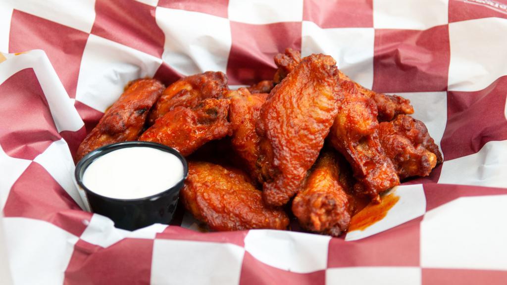 Traditional Wings · Tossed in your favorite wing sauce.