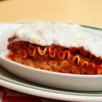 Lasagna With Meat Sauce · Lasagna noodles layered with three cheeses, Italian spices and family recipe pasta sauce.