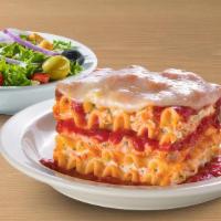 Small Lasagna · Lasagna noodles layered with three cheeses, Italian spices and Family Recipe Meat Sauce. Ser...