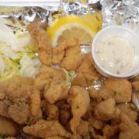 Catfish · Fried or grilled. Two pieces includes two sides.