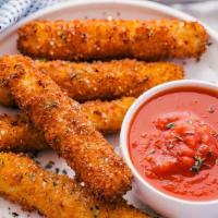 Mozzarella Sticks · 5pc Lightly battered Mozzarella cheese, fried to perfection and served with ranch.