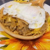 Chilaquiles Skillet · two eggs any style ,grilled chicken,homemade tortilla chips,homemade salsa and mozzarella ch...