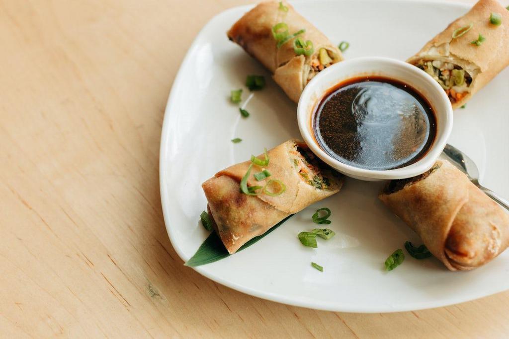 Roasted Pork Crispy Spring Rolls · With chili soy sauce.