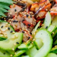 Ika Salad · Marinated squid with sliced cucumbers in ponzu