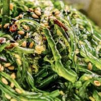 Seaweed Salad · Seaweed topped with sesame seeds in ponzu.
