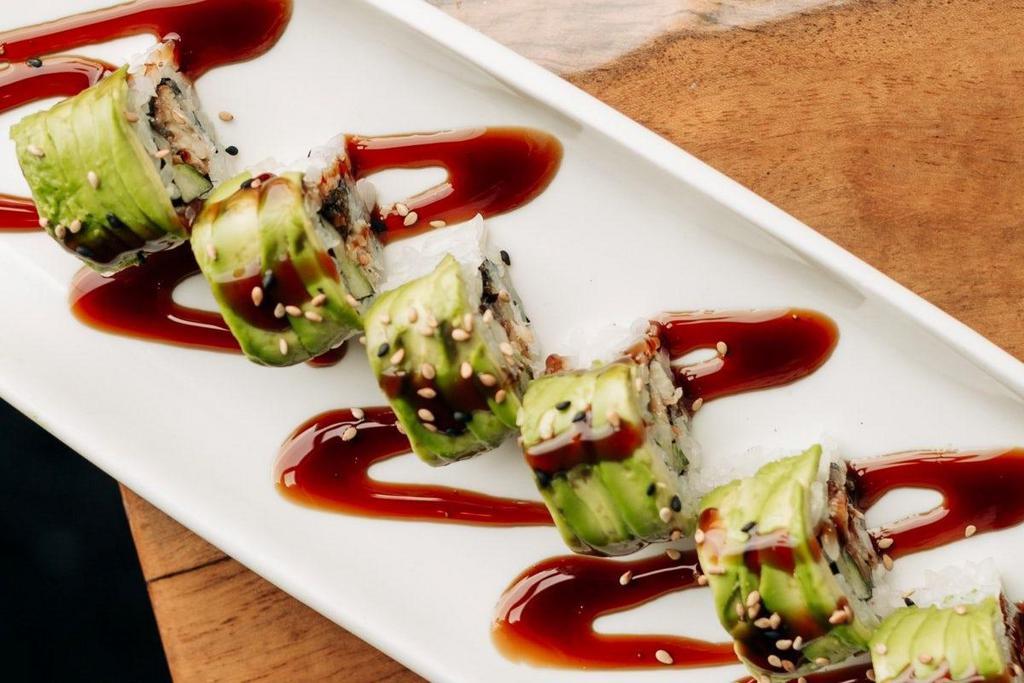 Caterpillar Roll · Eel and cucumber, topped with avocado, sesame seeds and eel sauce.