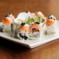*The Fresh Prince · Snow crab, avocado, red bell, and asparagus. Topped with salmon, black tobiko, basil aioli a...