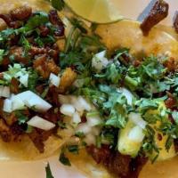 Tacos · Popular dish which consists with your choice of chicken, steak, pastor, chorizo or chicharro...