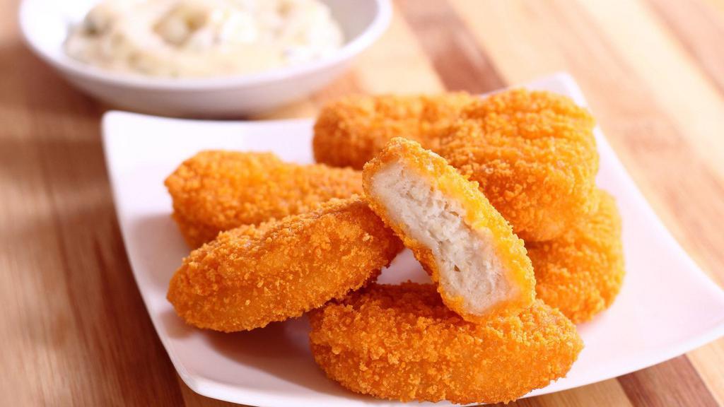 Chicken Nuggets · Eight pieces of breaded and fried chicken nuggets.