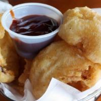 Beer Battered Onion Rings · Eight Beer Battered onion rings served with Roasted red Pepper Aioli or RTS BBQ Sauce.