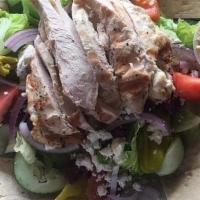Goal Line Greek Salad · Cucumber, tomato, red onion, olives, Feta cheese & crisp lettuce tossed in a Mediterranean v...