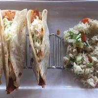 Blackened Fish Tacos · 3 tacos filled with fresh blackened fish & guacamole mayonnaise.  Topped with our housemade ...