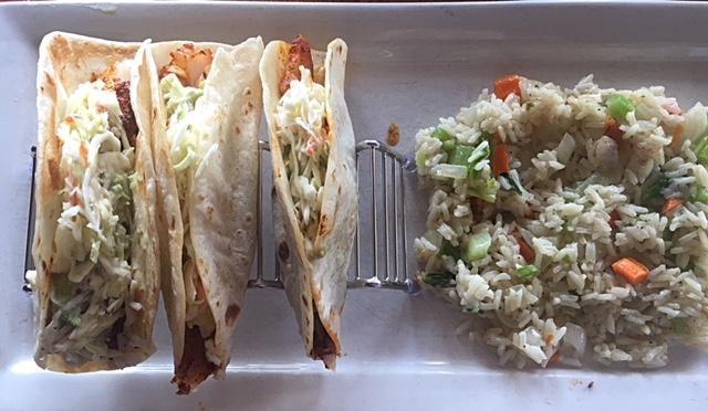 Blackened Fish Tacos · 3 tacos filled with fresh blackened fish & guacamole mayonnaise.  Topped with our housemade coleslaw and served with Spanish Rice.  Add a soup or house salad for a buck!
