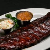 Barbecued Baby Back Ribs · Half or full slab of ribs, zesty barbecue sauce, cole slaw