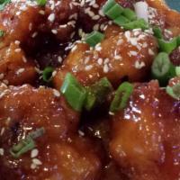  Sesame Chicken · Chucks of boneless chicken, deep-fried, sauteed with sweet & spicy sauce and topped with ses...