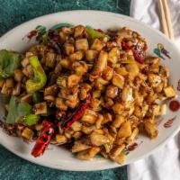 Kung Pao Chicken · Diced chicken sauteed with vegetables & peanuts in hot red pepper sauce.